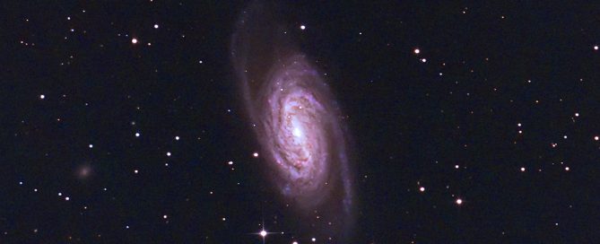 NGC 2903 is a barred spiral galaxy in Leo